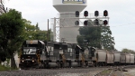 NS 6703 leads train 58Z past the signals at Aycock